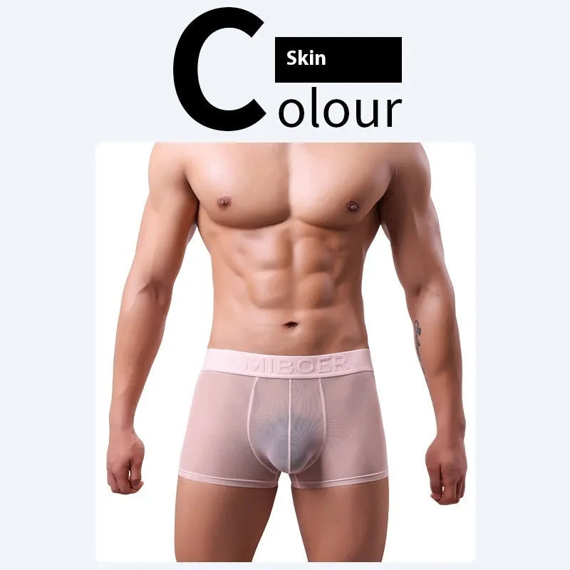 Men's thin solid colour boxer shorts in black, laid flat to show knit texture and seamless design