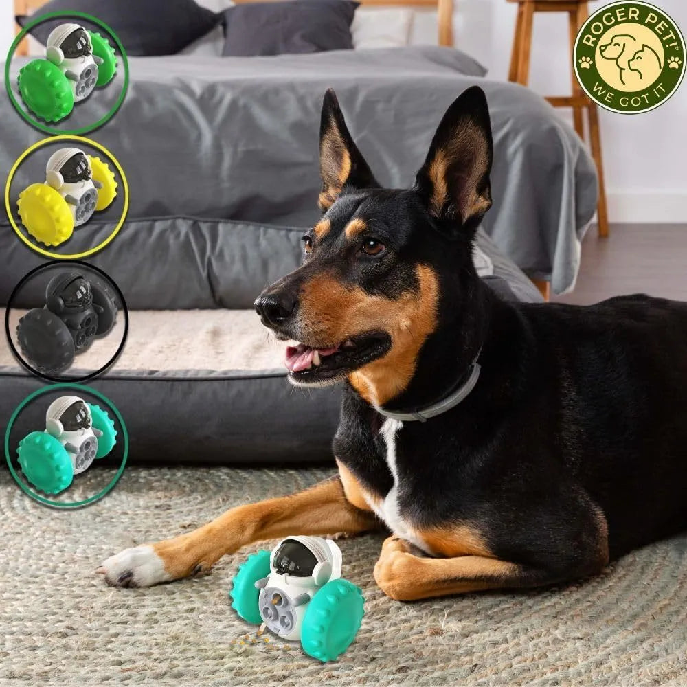 Robot-shaped self-balancing dog treat dispenser toy in green, showing size for small pets