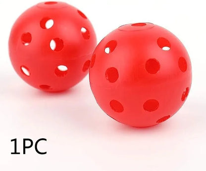 Multi-colour golf practice balls in red, orange, blue, green, white, and yellow, 42mm diameter, packed in a net pocket