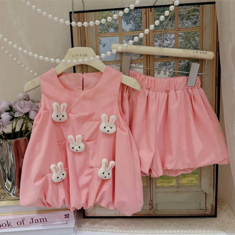 Sleeveless bud-shaped pants suit three-dimensional doll in pink or yellow cotton with cartoon style