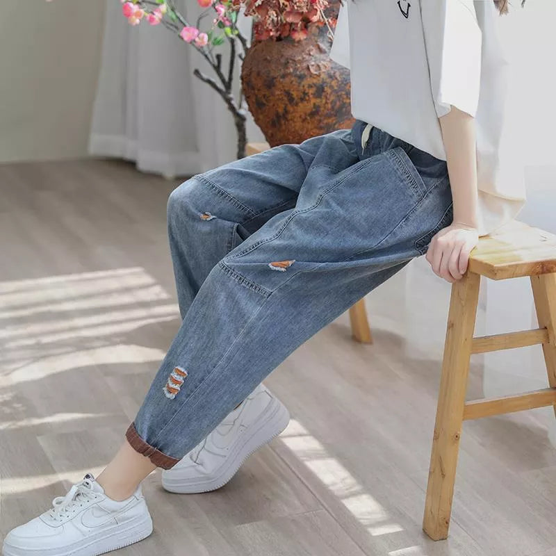 Women's Summer Fashion Ripped Ninth Jeans in green and orange