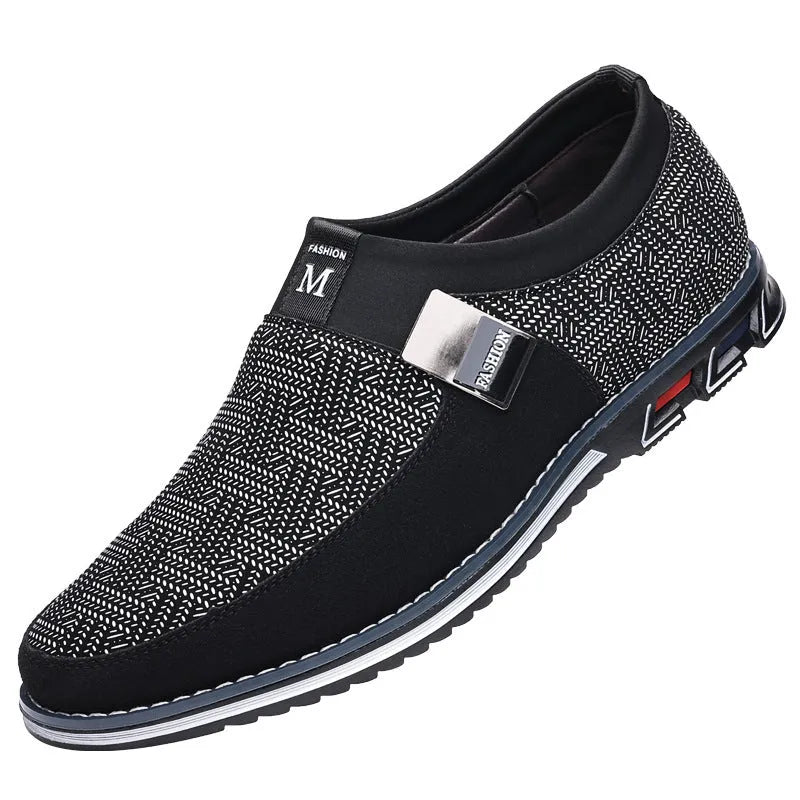 Men's grey and white synthetic leather casual shoes with square toe and flat rubber sole.