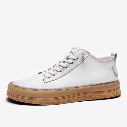 Men's black casual shoes with round toe, lanyard closure, and soft rubber soles on a neutral background