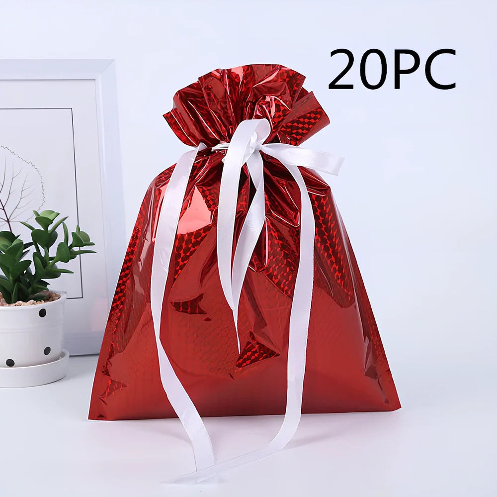 Christmas gift bag with drawstring closure in laser gold finish, 32x24cm dimensions