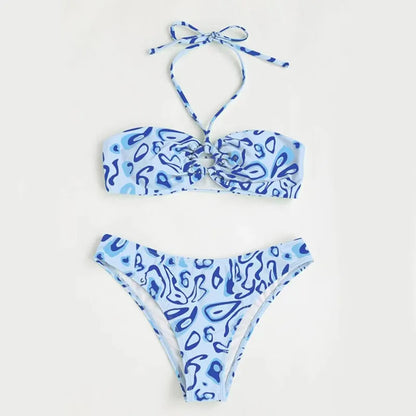 Blue floral pattern bandeau bikini swimsuit with backless design on mannequin