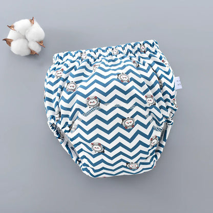 Washable baby training pants with 6-layer gauze construction in assorted patterns including animals and geometric designs