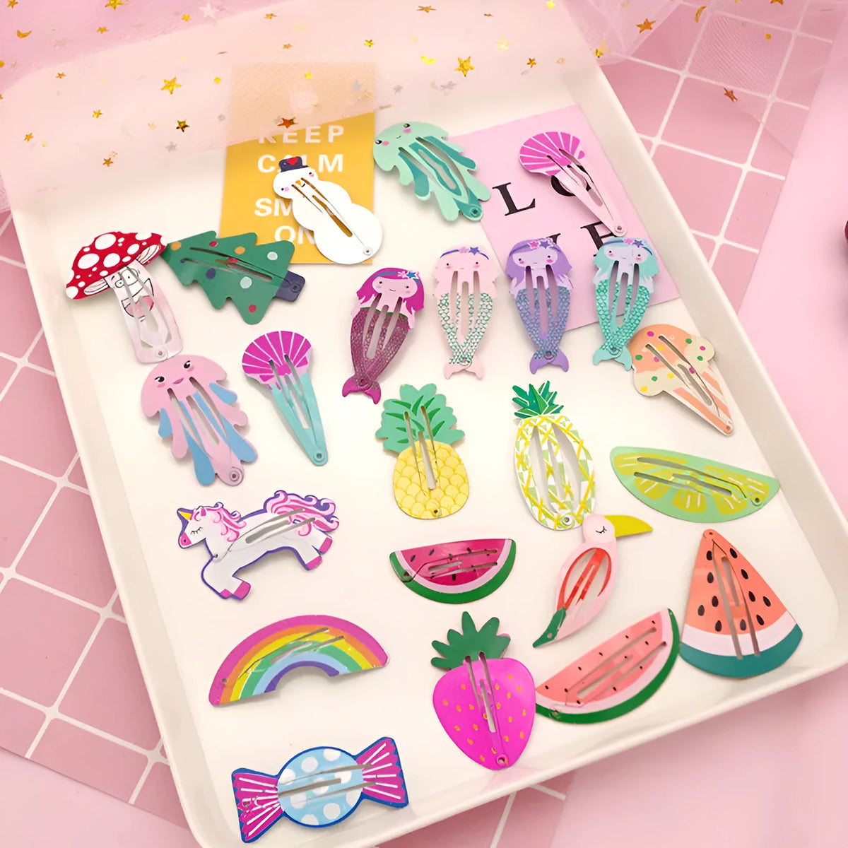 Colourful metal hair barrettes for children with printed watermelon, strawberry, pineapple and Christmas designs.