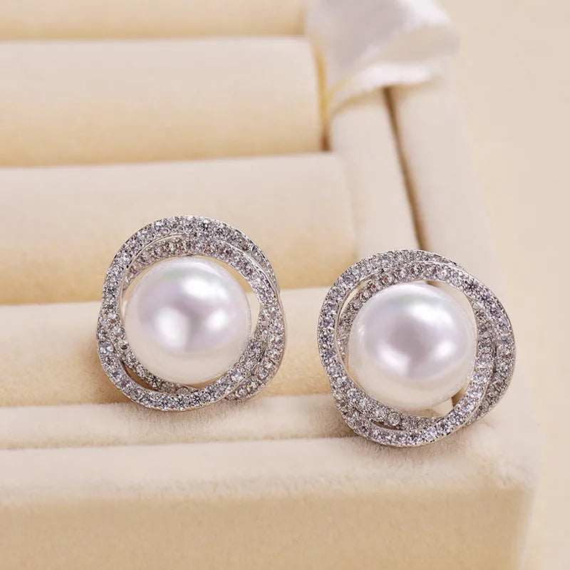 Rose pearl stud earrings with silver needle, rhinestone inlay, copper geometric circle design, white or yellow gold colour.