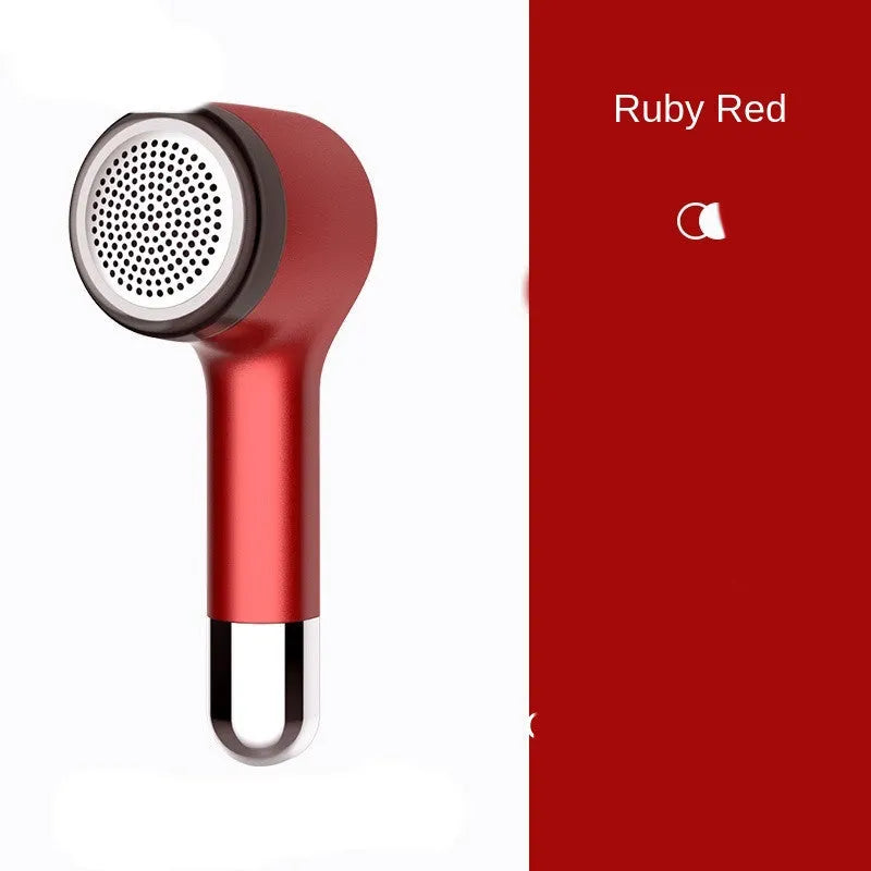 USB rechargeable hair ball trimmer in black, green, red, or white on a fabric background.