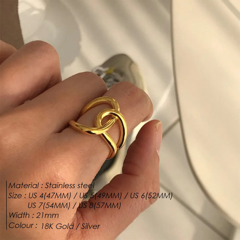 Knotted women's adjustable ring with an opening and U-shaped geometric design in stainless steel and two colour finishes, available in UK women's sizes 4, 5, 6, 7, and 8 in a contemporary, trending style.