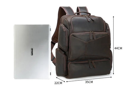 Dark brown leather backpack with embossed texture, double shoulder straps, and multiple zippered compartments for 17-inch laptops