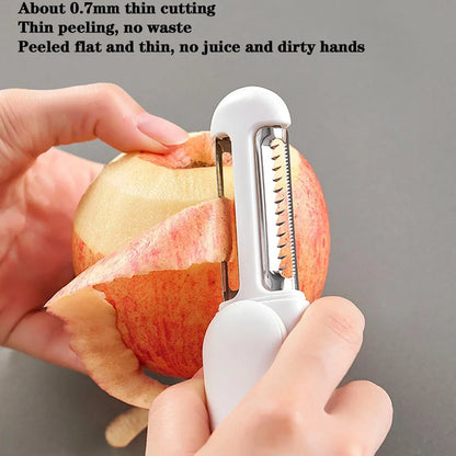 White 3-in-1 rotary paring knife with stainless steel blades showing 360° rotating mechanism