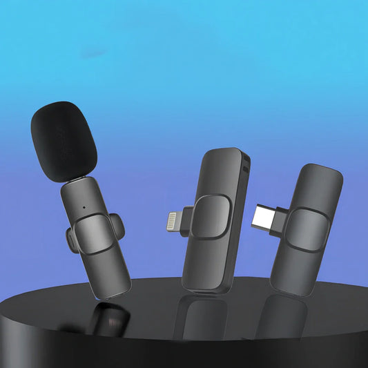 Wireless lavalier microphone with clip showing compact 130x90x25mm dimensions and multiple interface connectors