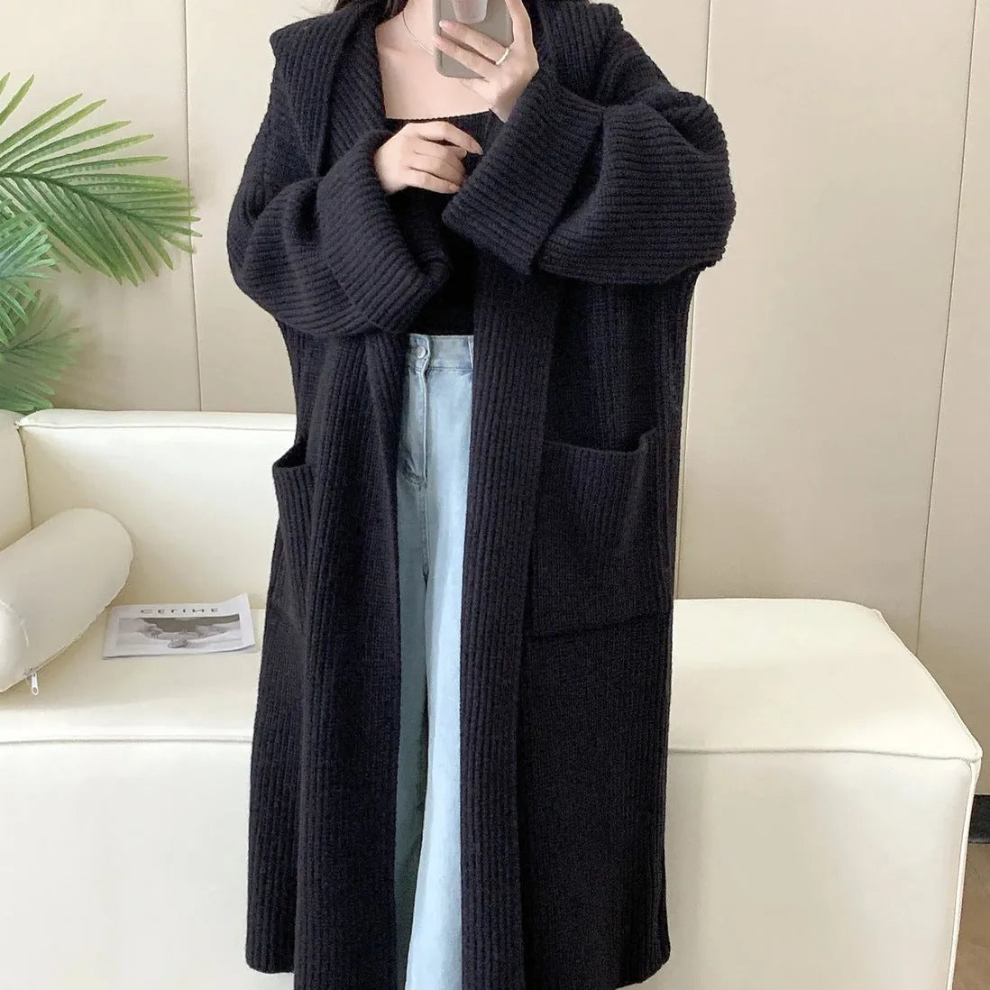 Loose hooded women's cardigan with raglan sleeves in milky white colour showing extended 80cm length