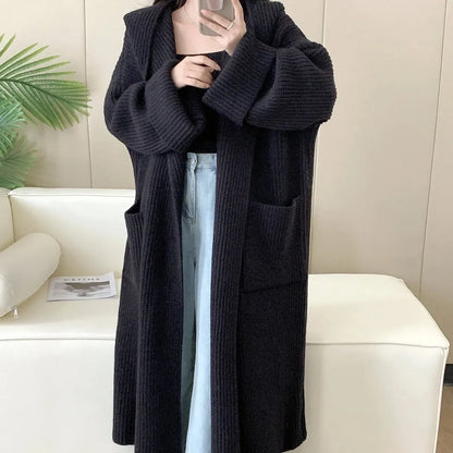 Loose hooded women's cardigan with raglan sleeves in milky white colour showing extended 80cm length