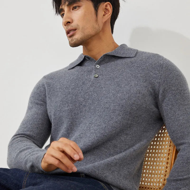 Men's sapphire blue cashmere pullover sweater with a polo collar, laid flat.