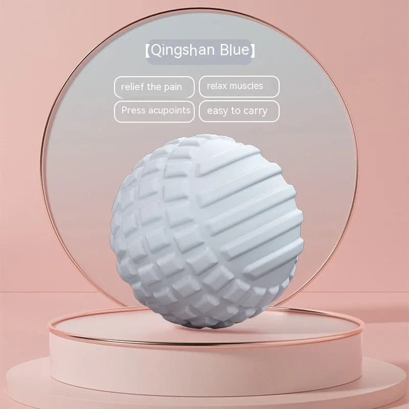 A 6cm diameter pink TPR foot massage ball on a plain background.
