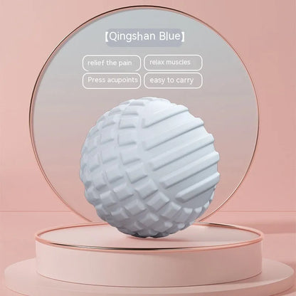 A 6cm diameter pink TPR foot massage ball on a plain background.