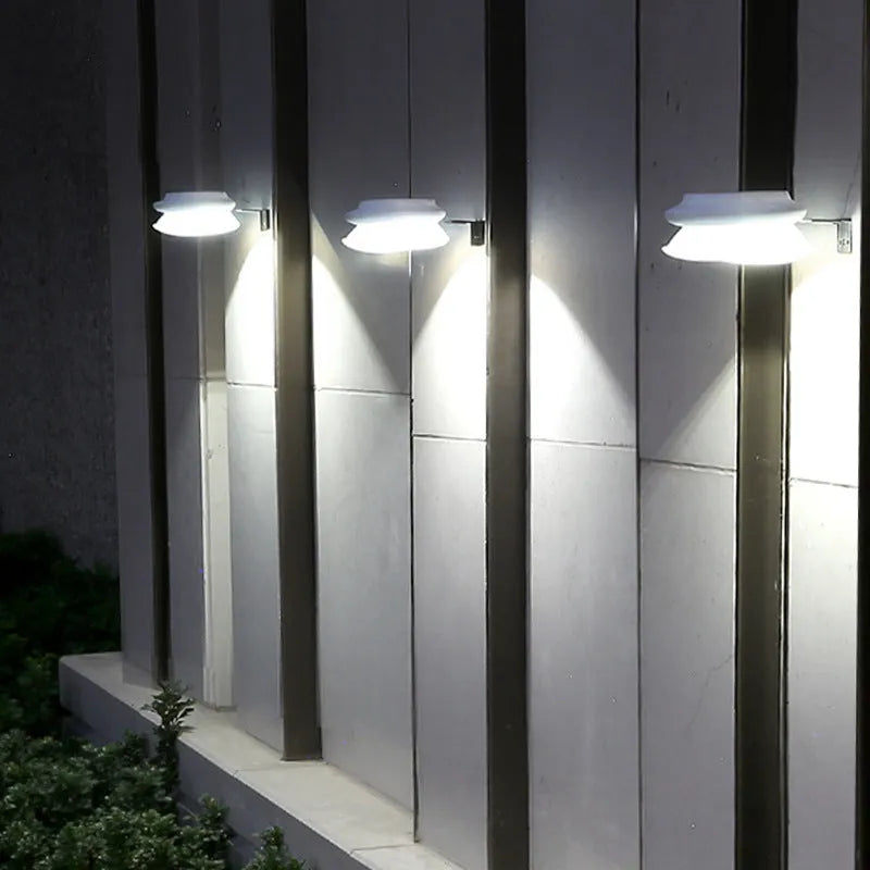 Solar-powered outdoor fence wall lamp with 9 LEDs for garden patio decoration