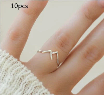 Handcrafted mountain-shaped copper ring with unique design and antibacterial properties