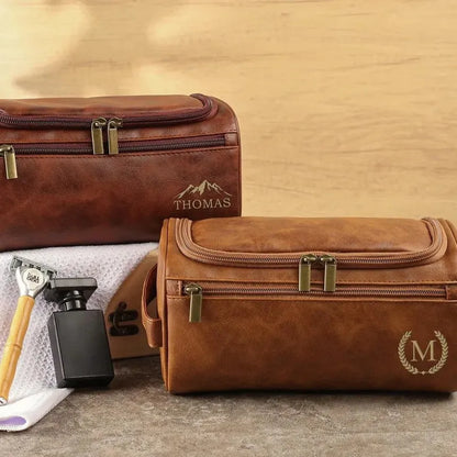 Men's leather-look PU toiletry bag shown in black, brown, dark brown, and light brown colour options.