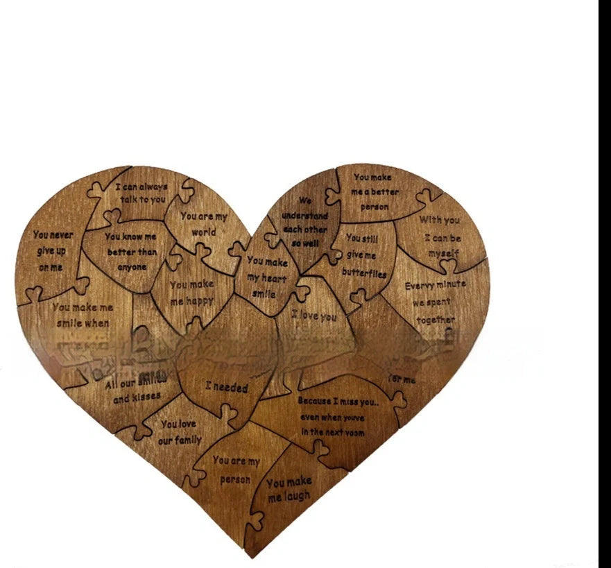 Wooden heart puzzle with love messages for romantic gifts, light brown color.