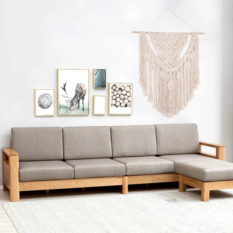 Beige hand woven cotton tapestry 115x100cm hanging on living room wall, textured weave detail