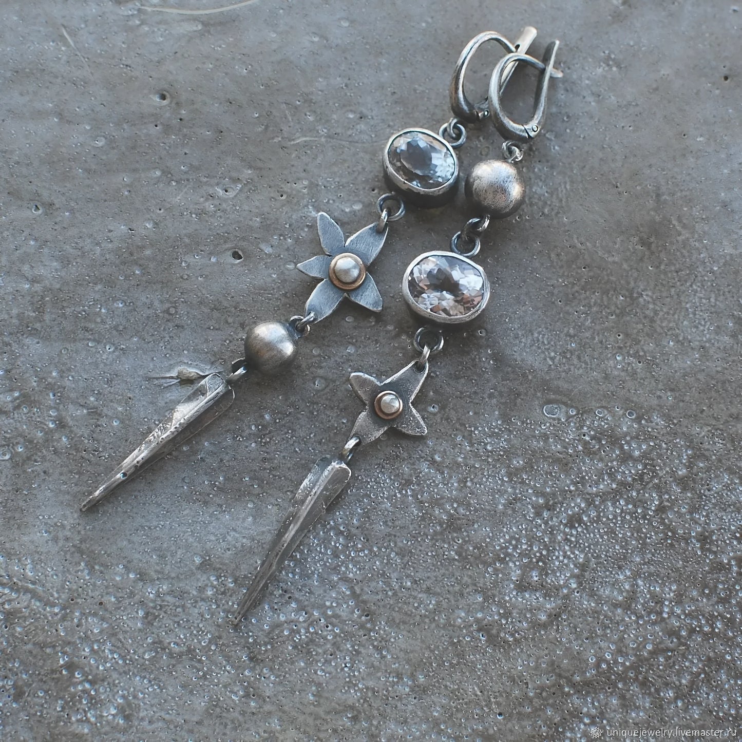 Pair of long antique silver geometric XINGX pendant earrings with rhinestone details on alloy posts.