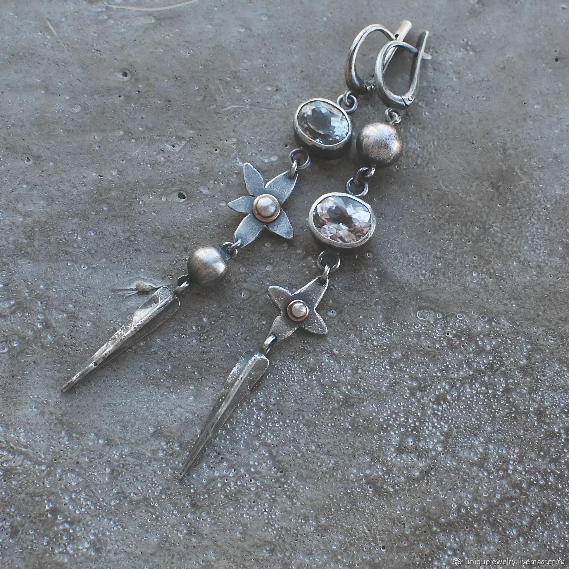 Pair of long antique silver geometric XINGX pendant earrings with rhinestone details on alloy posts.