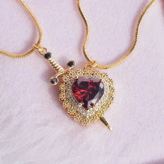Gothic Punk Couple Necklace with heart and dagger design in stainless steel and red rhinestone