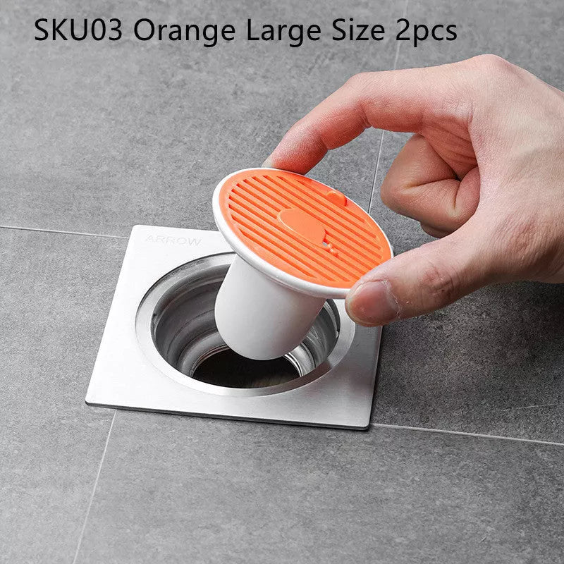 Whale Magnetic Suction Floor Drain Cover in white, orange, or green, blocking sewer odors with a tight seal