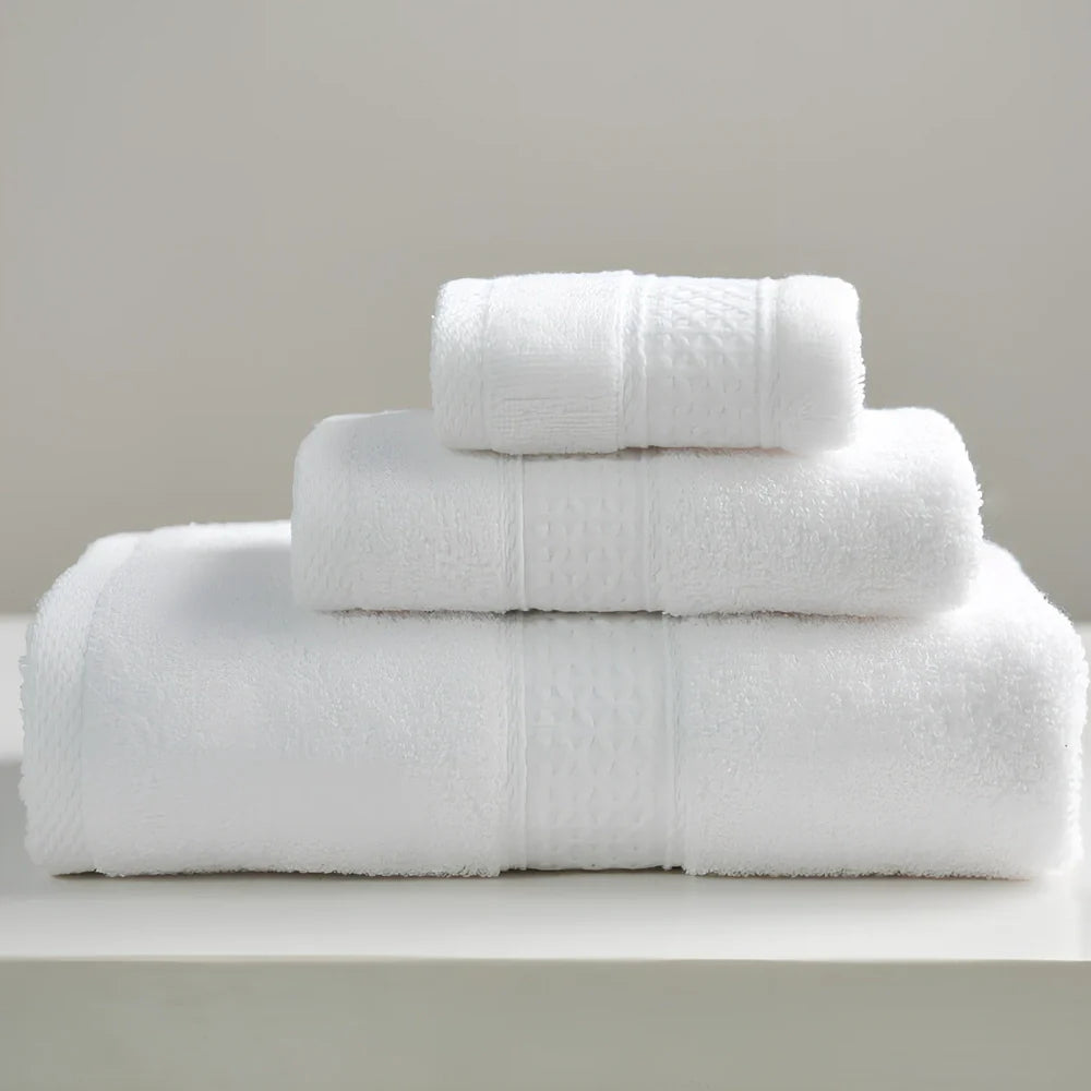 Three cotton towels: 33cm square, 32cm×73cm standard, 70cm×140cm bath towel in coordinated colours