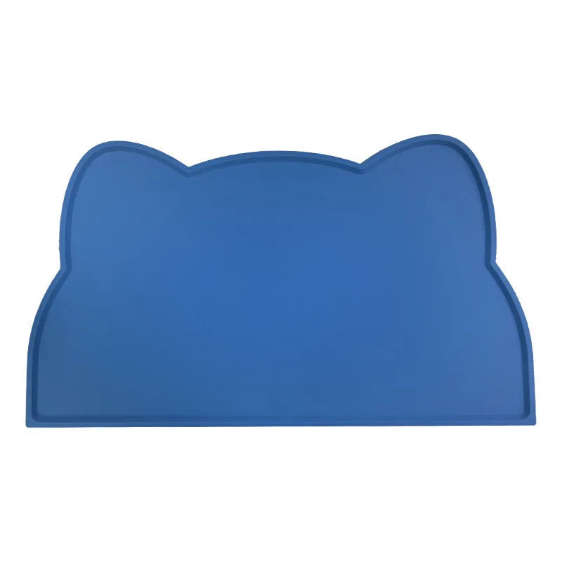 Blue silicone pet feeding mat in cat head shape for dog and cat food bowls