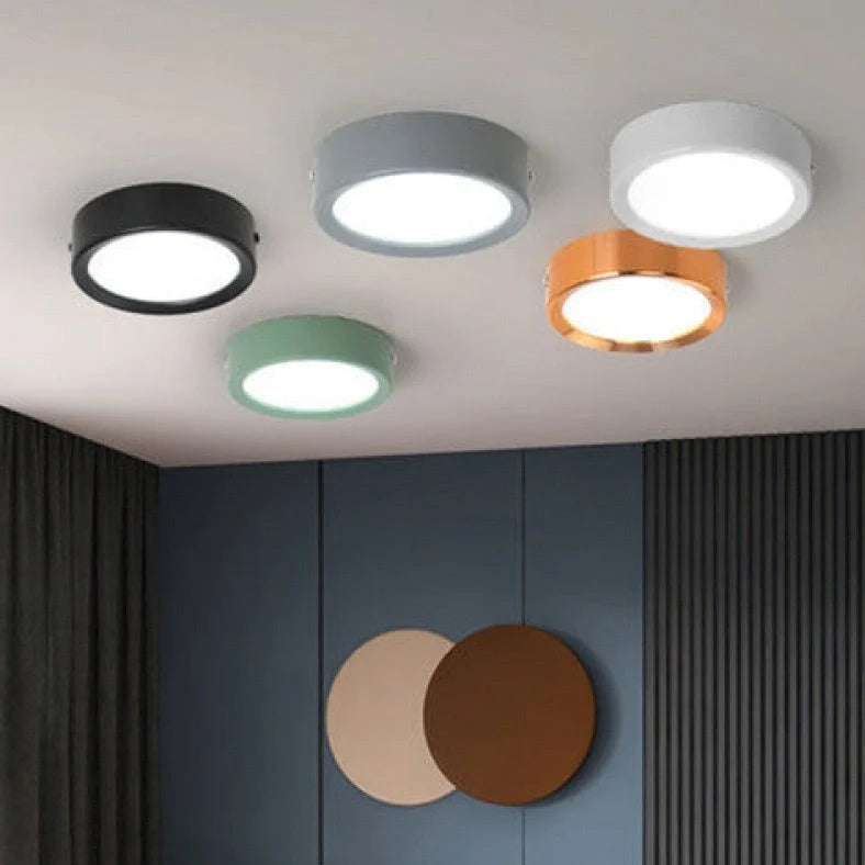 Ultra-thin 1.5cm LED surface mounted downlight in black shell with adjustable colour temperature lighting
