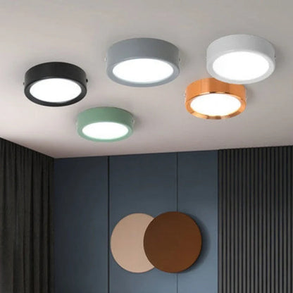 Ultra-thin 1.5cm LED surface mounted downlight in black shell with adjustable colour temperature lighting