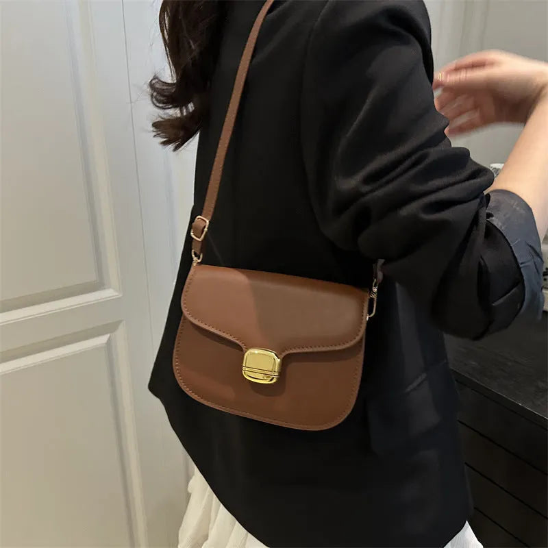 Simple PU leather women's handbag with phone pocket and change compartment in six colour options