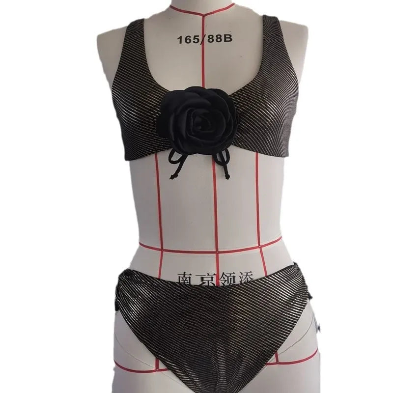 Black women's triangle swimsuit with sleeveless design for beach and swimming activities