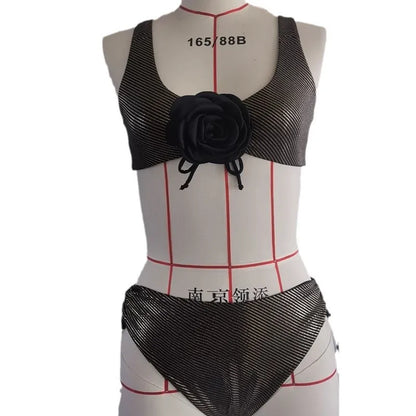Black women's triangle swimsuit with sleeveless design for beach and swimming activities