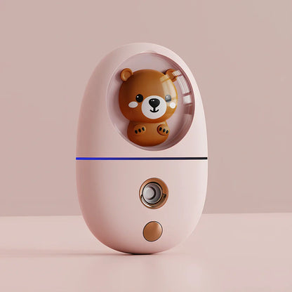 Cartoon USB facial humidifier measuring 62x32x96mm with bear-pink colour and water replenisher