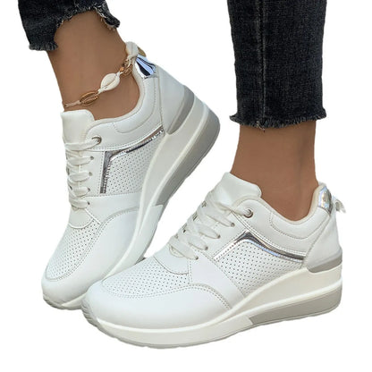 Women's white PU leather wedge platform sports shoes with front lace-up closure.