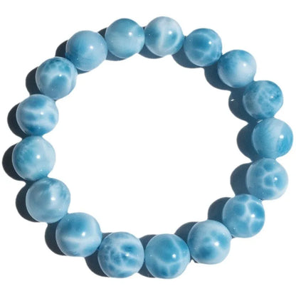 Blue bodhi bracelet with pearl accents showing bead sizes from 6mm to 14mm in Maillard style design