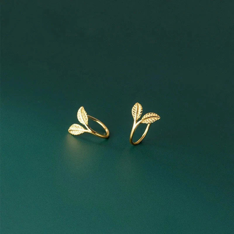 Handmade S925 sterling silver branch bud earrings in gold and white gold finishes.