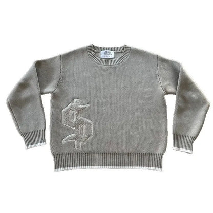 Grey loose-fitting jacquard knit coat with long sleeves on a hanger