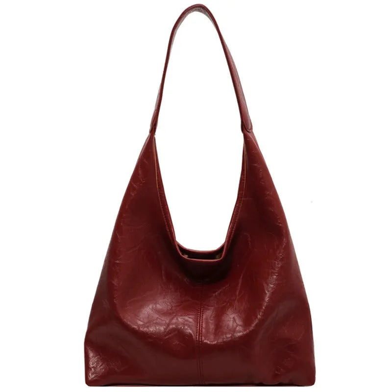 Casual soft leather large capacity shoulder bag in black with sandwich pocket and sewing thread details