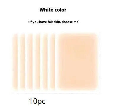 Tattoo cover patch and a 130mm long concealer brush on a table, with colour option swatches visible.