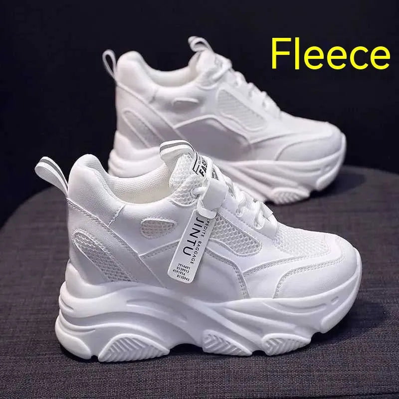 Women's black mesh platform casual shoes with hollow-out design detail on white background