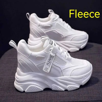 Women's black mesh platform casual shoes with hollow-out design detail on white background