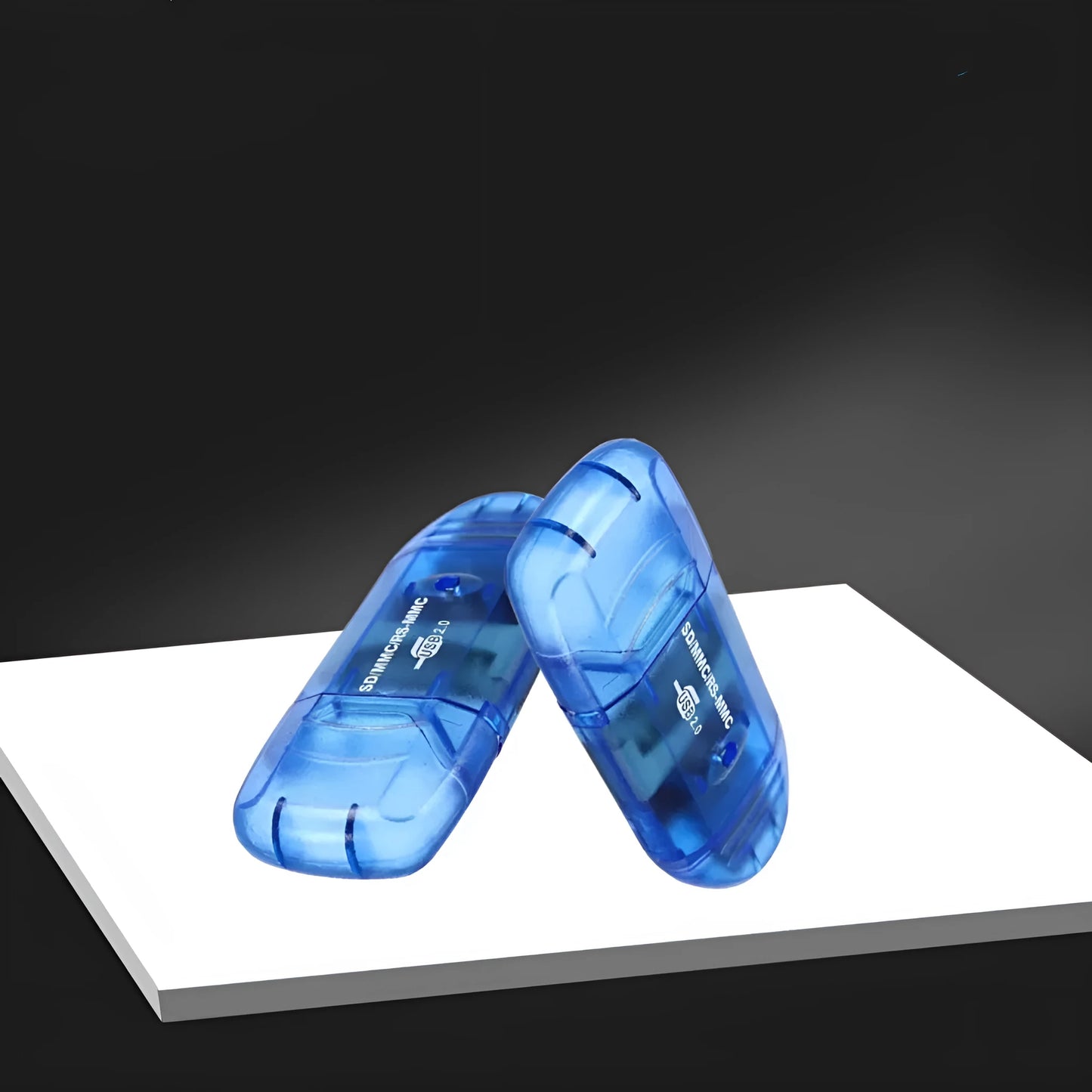 Transparent plastic USB card reader with LED light option, measuring 7.5 inches in length.