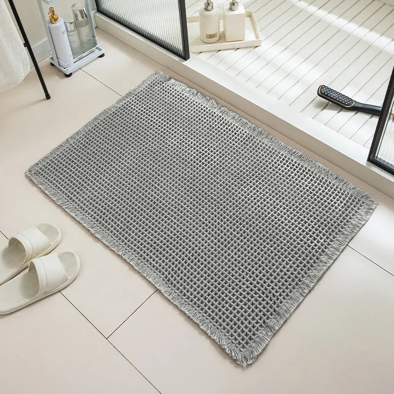 Checkered pattern non-slip bathroom carpet in beige colour with woven polyester construction