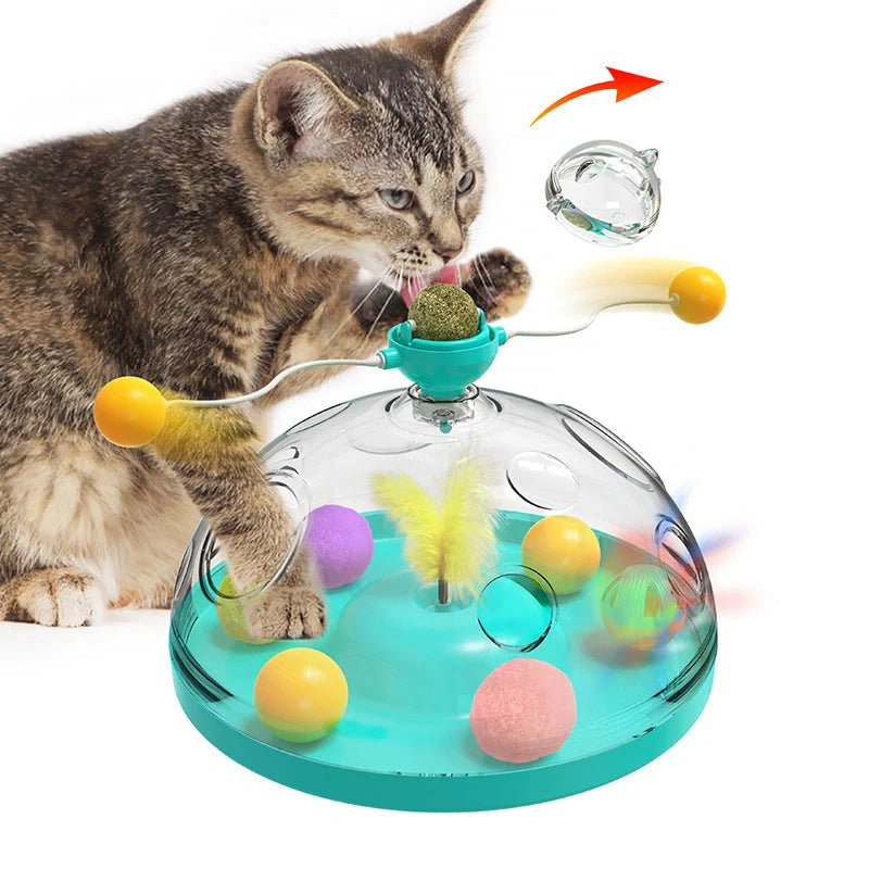 Interactive cat toy with twirling sticks and luminous catnip ball